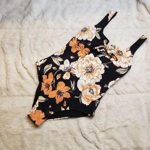 Roxy women's one piece black flower small swim suit NWT